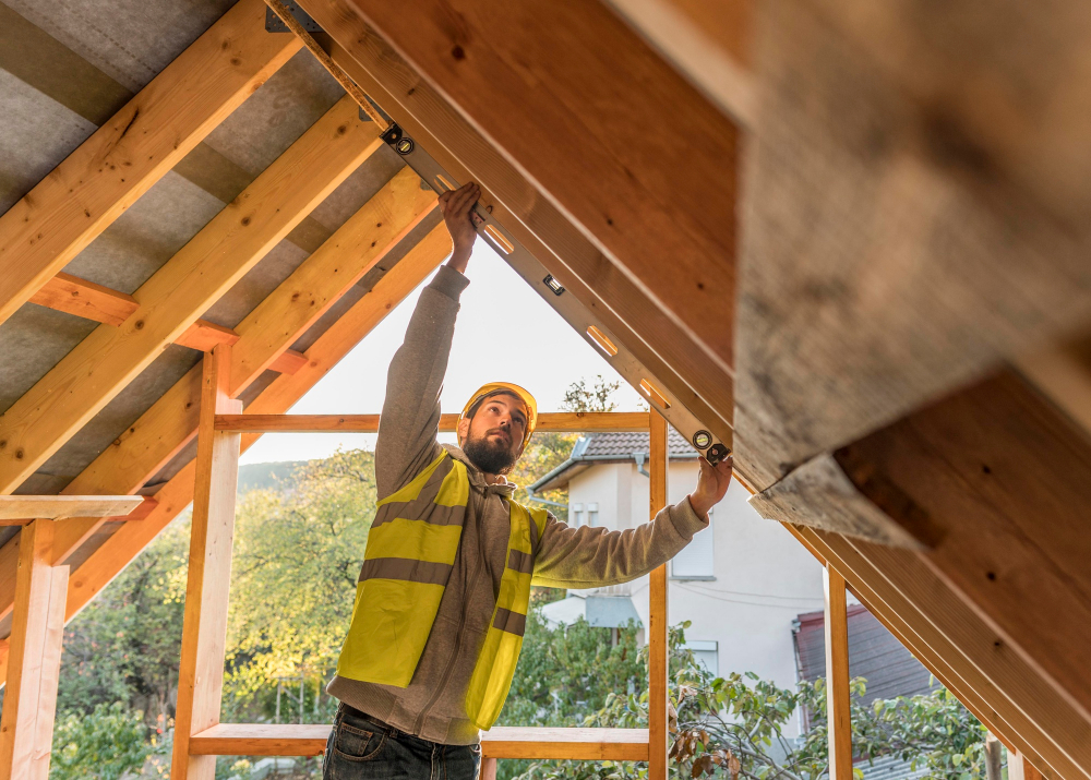 Property professional inspecting roof framing for possible rat access points in Redondo Beach